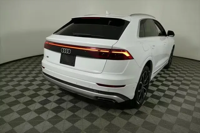 An Audi Q8 in a photo booth, ready for its listing